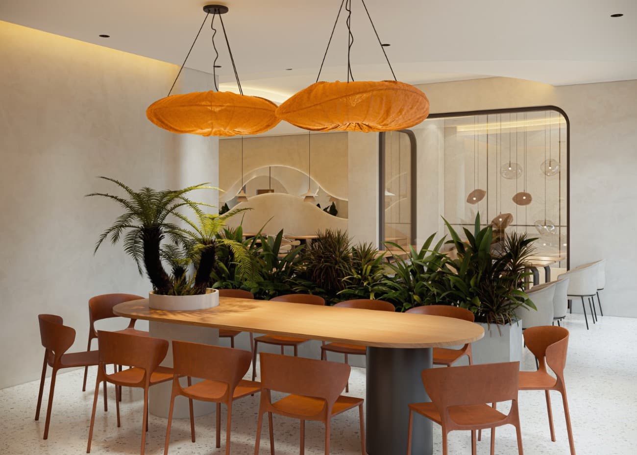 Phối cảnh khu ngồi mô hình Flagship Phúc Tea với bàn dài, ghế cam và đèn treo